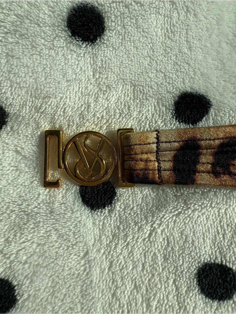 Victorias Secret gold circular